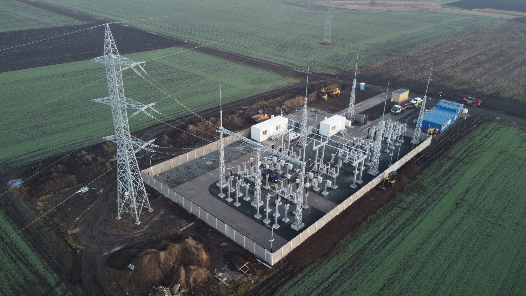 Grid substation adjacent to renewable energy infrastructure